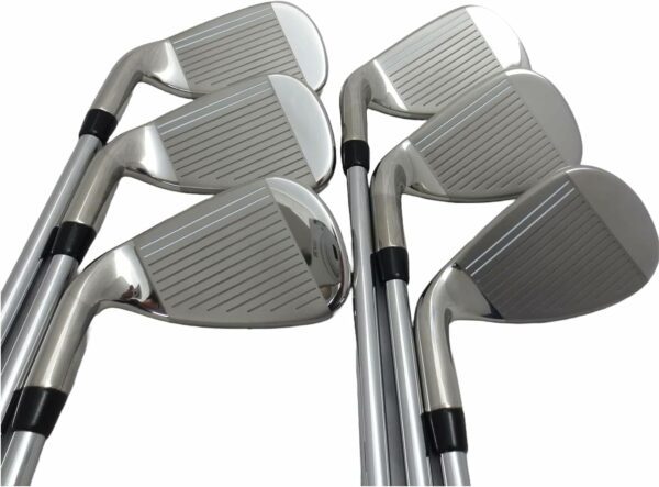 Set of metallic golf club irons with polished grooved faces for optimal ball spin and control