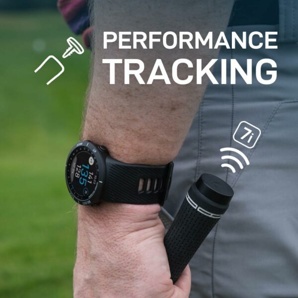 Golfer wearing smartwatch tracking performance metrics while holding a golf club with wireless sensor integration